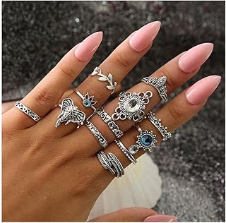 Set of hollow flower rings carved in Boho Cambisis rhinestones for women and girls.. Your digital shopping companion, DIAYTAR NIGERIA offers exceptional value with delivery in less than 8 days.