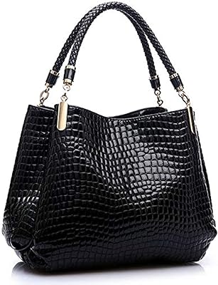 PU leather designer designer handbag with shoulder strap.. Experience retail therapy without the financial stress at DIAYTAR NIGERIA's affordable e-commerce platform.