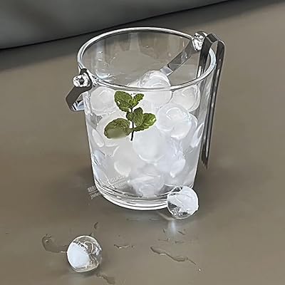 JT glass ice bucket with stainless steel handle, diameter 12.2 cm, height 133 cm, capacity 920 ml with ice clamp.. Your digital shopping companion, DIAYTAR NIGERIA offers exceptional value with delivery in less than 8 days.