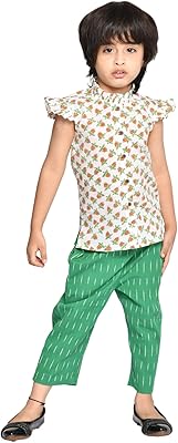 A pajama set made up of a cotton top for little girl from 6 months to 4 years old, made up of a green and white printed blouse and pants for young children.. DIAYTAR NIGERIA brings the marketplace to your home with budget-friendly prices and nationwide delivery.