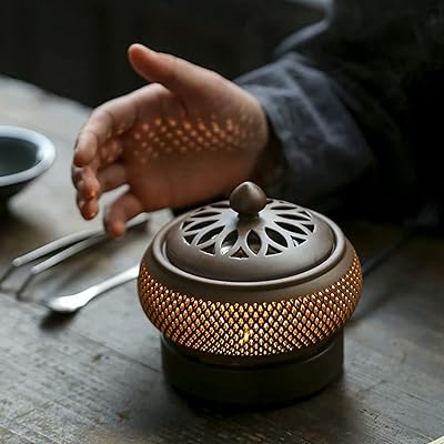 Electric ceramic incense burner: aromatic delight with timer, temperature control and lid - perfect for air purification, interior decoration and peaceful meditation.. Spend less, get more — that’s the DIAYTAR Nigeria promise.