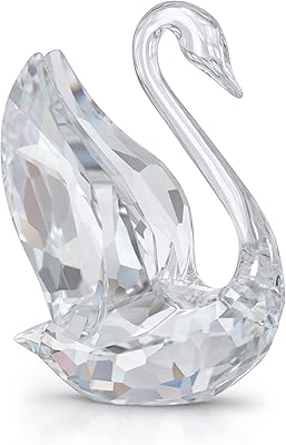Swarovski Signum Swan Charm with transparent crystal swan figurine, from the Iconic Swan collection.. Experience the future of online shopping with DIAYTAR NIGERIA's extensive product range and competitive pricing.