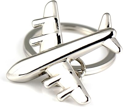 Metal keychain with plane design in fashionable polished silver, silver, s.. DIAYTAR NIGERIA: Connecting Nigerians with their needs through our affordable and diverse marketplace.