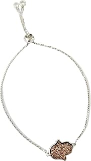 Trending Fatima handbra, silver color with bronze stone inside.. Join the movement — fast, affordable shopping only at DIAYTAR Nigeria.