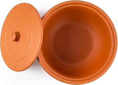 Large Luxeol Luxeol Marmit with terracotta lid casserole dish on the stove.. Discover why thousands choose DIAYTAR NIGERIA for affordable products delivered in less than a week.