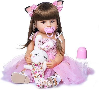 Realist 2 -inch silicone reborn baby doll, pretty bath doll with cat -shaped band and pink dress.. DIAYTAR NIGERIA connects you with thousands of products at competitive prices, delivered within a week.