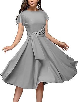 An elegant Audrey Hepburn dress for women with a round neck, 3/4 sleeves and a mid-long swing.. DIAYTAR NIGERIA connects you with thousands of products at competitive prices, delivered within a week.