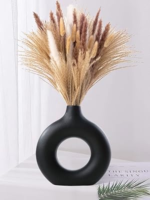 Round vase in matt black ceramic with simple artistic pattern, for the house, the living room, the office, the kitchen, table decoration, 1 room (size L).. Discover the convenience of DIAYTAR NIGERIA's vast e-commerce platform with delivery in just 5-8 days.