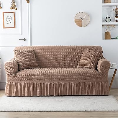 Colotol Universal Sofa Cover with skirt, for 1/2/3/4 sofa, high elasticity Searsacre fabric with skirt, for living room and bedroom (camel, 3 places).. DIAYTAR NIGERIA transforms online retail with unbeatable prices and consistent delivery timeframes.