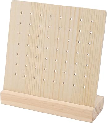 Wooden display for necklaces and earrings with Howlls keychain.. Why shop anywhere else? DIAYTAR Nigeria has it all and delivers fast.