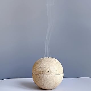 Round incense burner in natural marble handmade with 9 holes for decoration of meditation, kitchen and coffee rooms by Sidcock (beige travertine).. Need it fast? Need it cheap? Choose DIAYTAR Nigeria.