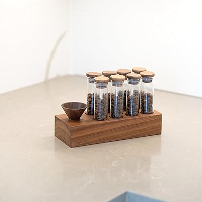 Comunita coffee beans | Standard bamboo cover | 8 borosilicate glass tubes + walnut wood base | Capacity 26 g | Coffee storage with one shot.. Experience the joy of discovery with DIAYTAR NIGERIA's vast catalog and nationwide affordable delivery.