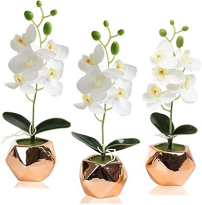 Flowers of white artificial orchid Natul, set of 3 artificial orchids, pink gold ceramic pot, phalaenopsis for the interior decoration of the home office.. DIAYTAR NIGERIA: Bridging the gap between consumers and quality products with affordable nationwide shipping.