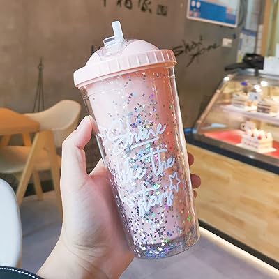 Thmin's water bottle with double layer plastic straw in colors.. Shop confidently with DIAYTAR NIGERIA's vast product range and budget-friendly nationwide shipping.