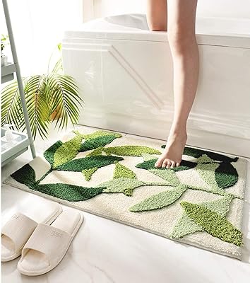 Bathing carpet pattern green leaves, non -slip, soft and absorbent, machine washable, microfiber, for bathroom and bathtub, size 17.5 x 25.5 inch.. DIAYTAR NIGERIA: Redefining e-commerce with affordable prices and reliable nationwide shipping.
