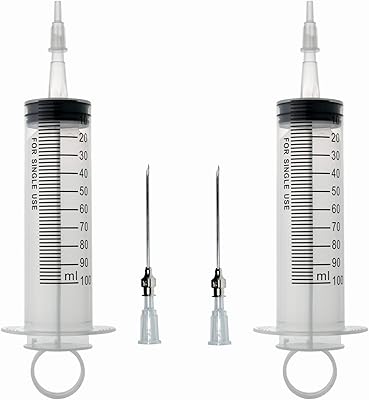 Large plastic syringe with needle to distribute glue.. DIAYTAR NIGERIA: Your partner in affordable online retail with reliable shipping across Nigeria.