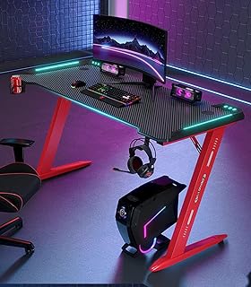 Ergonomic game desk with LED RVB lights on computer with fiber desktop.. DIAYTAR NIGERIA: Where affordable online shopping meets reliable delivery across Nigeria.