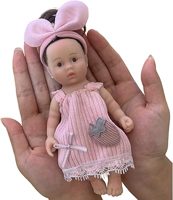Mini Baby Doll Sleeping Newborn 6 "15 cm silicone, full body, closed eyes, realistic baby girl girl with rooted curly hair, children's gift.. Experience shopping freedom with DIAYTAR NIGERIA's vast selection and 5-8 day nationwide delivery service.