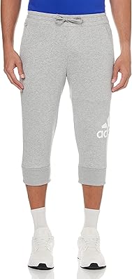 Adidas Essential Sport Pants 3/4 House length for men with large logo.. DIAYTAR NIGERIA redefines convenience with our vast product selection and swift nationwide delivery.