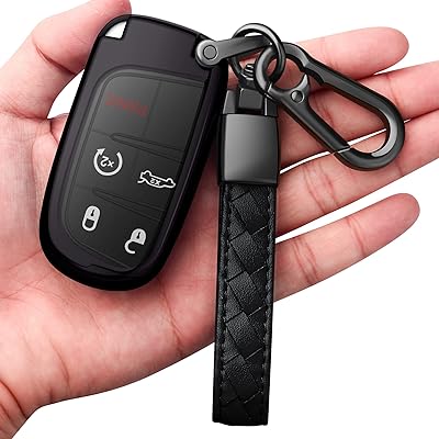 Protective cover for jeep key with flexible tpu leather keychain for large cherokee renegade chrysler 200 300 dodge ram durango challenger day dart fiat smart key, black.. DIAYTAR NIGERIA: Your affordable marketplace with reliable 5-8 day shipping across Nigeria.