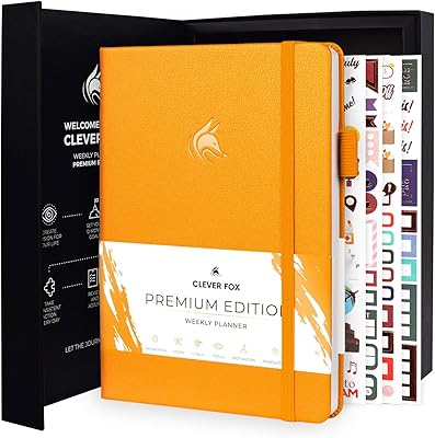 Planning notebook Clever Fox Deluxe by Planner - Luxury weekly and monthly planner not dated to increase productivity and achieve your objectives - organizer - Start at any time, A5, 1 year, amber yellow (weekly).. Elevate your shopping experience with DIAYTAR NIGERIA's vast catalog and budget-friendly options.