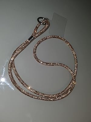Portable neck strap, chain, cord (crystal) with a plastic part to protect the case of the phone (gold).. Join the movement — fast, affordable shopping only at DIAYTAR Nigeria.