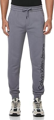 Casual pants with daring vertical logo calvin klein for men.. DIAYTAR NIGERIA: Your affordable gateway to thousands of products delivered within a week.