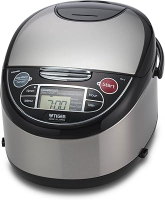 Tiger Jax-T10u-K Mecum rice cooker, capacity of 5.5 cups (not cooked) with steam cooker and simmer, black stainless steel.. Experience shopping freedom with DIAYTAR NIGERIA's comprehensive platform and reliable shipping service.