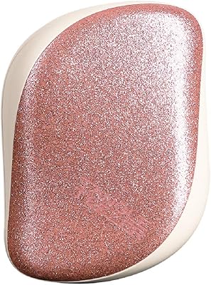 Mini Tangle Teezer Hair Brush - Shiny Rose Gold.. From kitchen tools to phones — DIAYTAR Nigeria ships it all in a week.