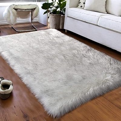 LIDUX Super soft soft carpet for bedroom, long hair, in false sheepskin, luxury floor mat, for bedroom, living room, children's bedroom, bedside table, desk, interior decoration (black and white, 60 x 90 cm).. Experience shopping without compromise at DIAYTAR NIGERIA, with vast selection and quick delivery.