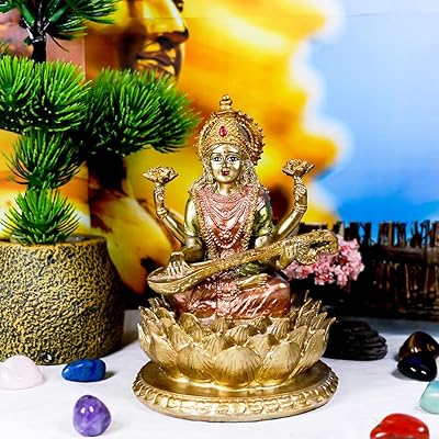Statue of the Hindu Lord Bang da Saraswati Indian music sitting on a sculpture.. DIAYTAR NIGERIA: Where every shopping need is met with affordable prices and reliable 5-8 day delivery.