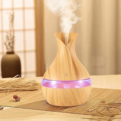 Air humidifier and aromatherapy oil diffuser with 7 LED colors, sensitive to touch, silent, 6 hours long lasting wooden air purifier for peaceful sleep at home and office.. Don’t wait weeks — DIAYTAR Nigeria delivers your order in just a few days.