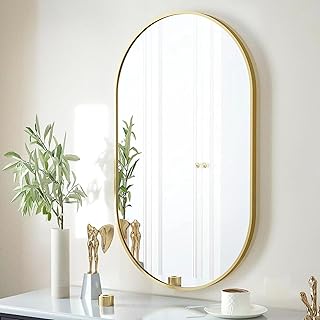 Wall oval mirror with elegant polished metal frame, size 20 inch x 31.5 inches, anti -rust oval mirror in noble gold color.. DIAYTAR NIGERIA delivers more than products - we deliver affordable solutions within the week.