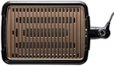 Smoke -free electric grill George Foreman 25850, interior grill with integrated drain tray, black.. DIAYTAR NIGERIA: Where every search yields affordable results delivered promptly to your door.