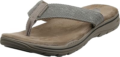 Eventid Rosen men's slippers from Skechers.. Experience the convenience of boundless shopping with DIAYTAR NIGERIA's vast selection and quick delivery.