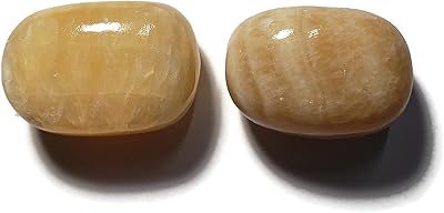 Set of 2 pieces of orange calcite 29 mm - 32 mm of quality A, precious stones of natural healing polished and polished healing of Türkiye.. Shop confidently with DIAYTAR NIGERIA, offering affordable prices and reliable delivery within a week.