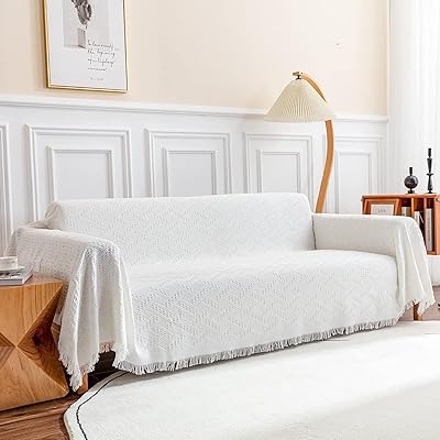 Thick non -slip sofa cover cover cowilted fabric towel with pompoms.. Shop the smart way with DIAYTAR NIGERIA's extensive selection and budget-friendly nationwide delivery.