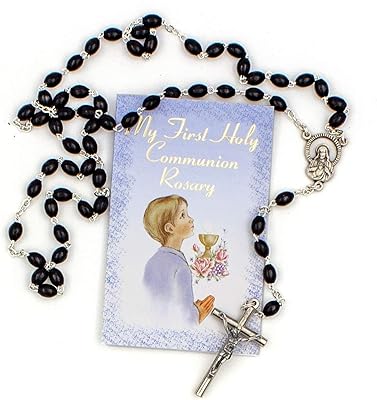 Silver metal coop collar with first communion with a blessing card.. DIAYTAR NIGERIA revolutionizes online retail with our vast selection and cost-effective delivery options.
