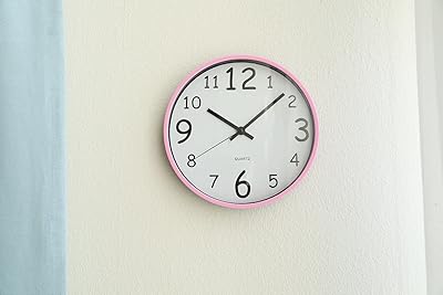 Pan Emirates Wall Clock Hon Final D25 cm - Rose.. DIAYTAR NIGERIA: Where convenience meets affordability with delivery across Nigeria in under 8 days.