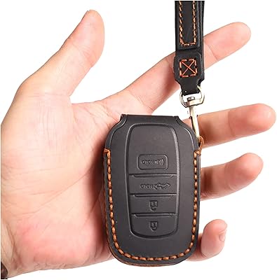 TOYOTA TURA 2022 keychain keychain with leather keychain (4 buttons).. Experience the satisfaction of affordable shopping with DIAYTAR NIGERIA's nationwide 5-8 day delivery.