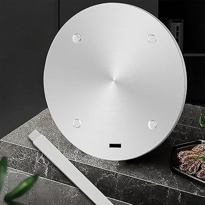 Thermal conduction plate for gas stove heat distributor in steel.. Your ultimate shopping destination, DIAYTAR NIGERIA combines extensive selection with affordable shipping.