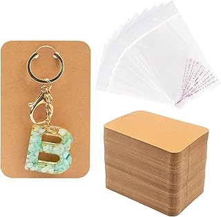100 pieces of keychain display cards with self-speculating bags, 3 "x 4.7" card holders for key cards display, jewelry packaging supplies.. Your shopping dreams realized through DIAYTAR NIGERIA's affordable platform with reliable delivery times.