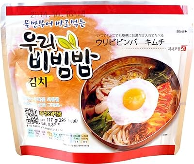Bol of rice mixed Korean bibimbap ready to eat Woori's 100g (3.53oz) 335 kcal - (Kimchi, 2 pack).. DIAYTAR NIGERIA: Where shopping is a pleasure with affordable prices and reliable delivery service.
