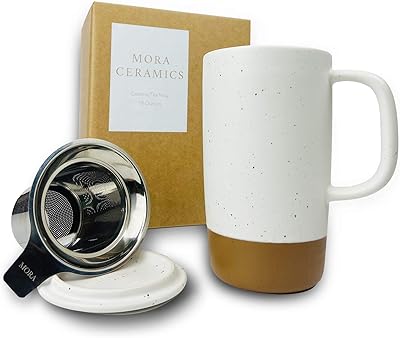 Large Mora Ceramics tea cup with infuser mobile leaves and ceramic lid.. DIAYTAR NIGERIA: Nigeria's answer to affordable online shopping with reliable 5-8 day delivery guarantee.