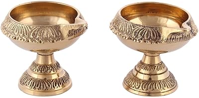 Pooja Indian oil lamp in handmade brass - Diya lamp in copper - (set of 2).. Discover a world of choices with DIAYTAR NIGERIA's extensive marketplace and prompt shipping service.