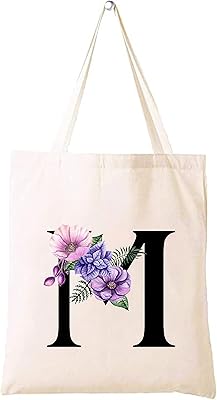 Cotton tote bag and environmental canvas with an initial floral print pattern for women - reusable racing bag, festive gift idea and cotton gift bag.. Shop quality and variety at unbeatable prices on DIAYTAR Nigeria — delivery in under 8 days.