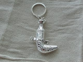 Oman keychain for car or house, a keychain with the Oman dagger logo, a gift, a keychain in silver suspended inside the car or the keychain.. Embrace a new era of online shopping with DIAYTAR NIGERIA's extensive range and budget-friendly prices.