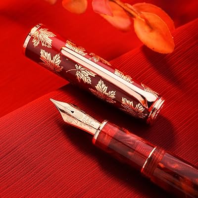 Hongdian n8 feather pen, ultra fine rose gold point with ebonite diet, red resin, caps sculpted in maple leaf with converter and metal case.. Experience the future of shopping with DIAYTAR NIGERIA's extensive selection delivered in just 5-8 days.