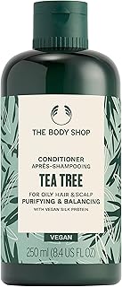 Purifying and balancing The Body Shop Tea Tree, for oily hair and scalp, vegan, 236 ml.. DIAYTAR NIGERIA: Revolutionizing how Nigerians shop with affordable prices and prompt delivery services.