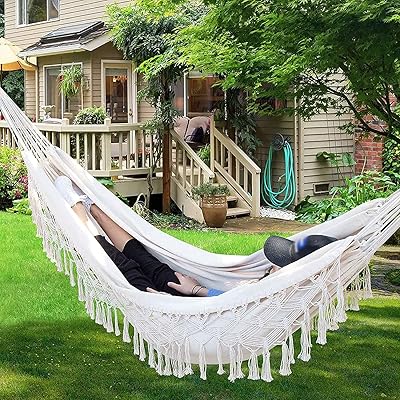 JT House double hammock net in luxury macrame with transport bag for patio, porch, bedroom, courtyard, beach, outdoor interior and wedding festival decoration.. Discover endless shopping possibilities at DIAYTAR NIGERIA, with budget-friendly prices and reliable delivery.